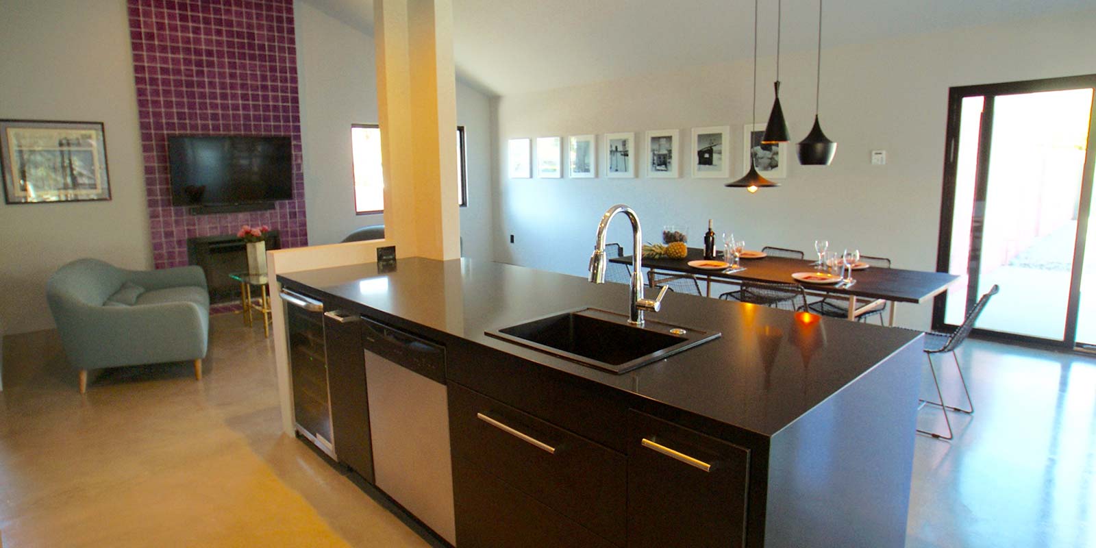 Sleek island kitchen  with winecooler